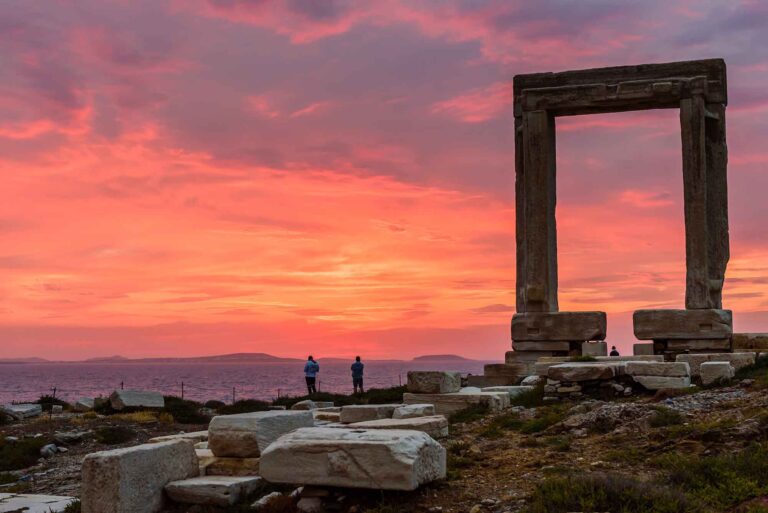 Naxos island, Greece - JUNE 3: the Ancient marble gate "Portara" - the entrance to the temple of Apollo in JUNE 3, 2015, Naxos island, Cyclades, Greece.